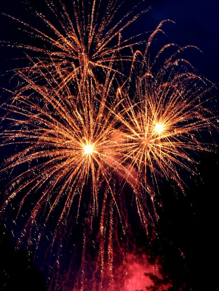 programs-02 Bright and colorful fireworks display lighting up the night sky, perfect for celebrations and festive occasions.